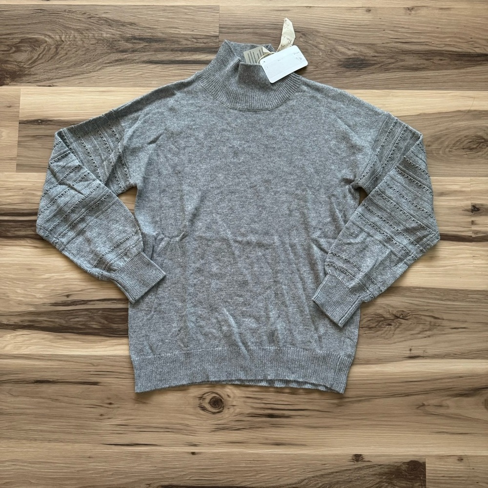 Hem and Thread Sweater